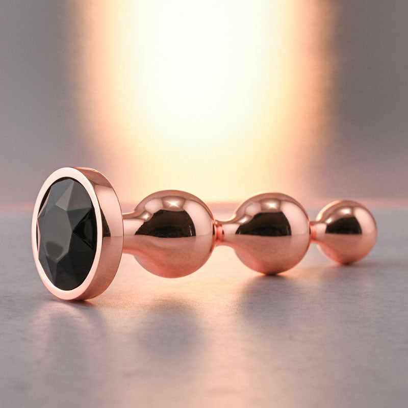 Gender X Gold Digger Small Rose Gold Small Butt Plug With Black Gem Base