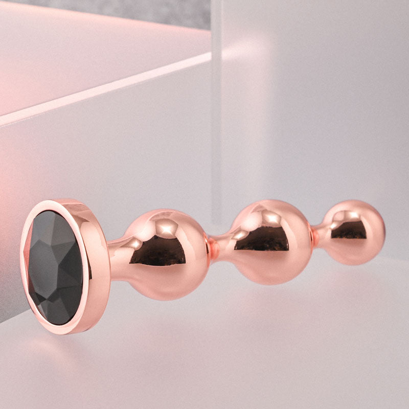 Gender X Gold Digger Small Rose Gold Small Butt Plug With Black Gem Base