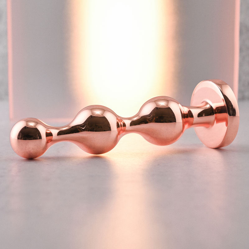 Gender X Gold Digger Large Rose Gold Large Butt Plug With Black Gem Base