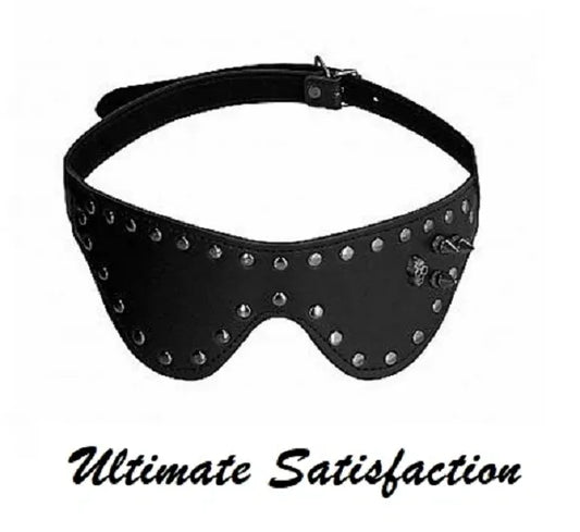 Mask with skull and spike feature