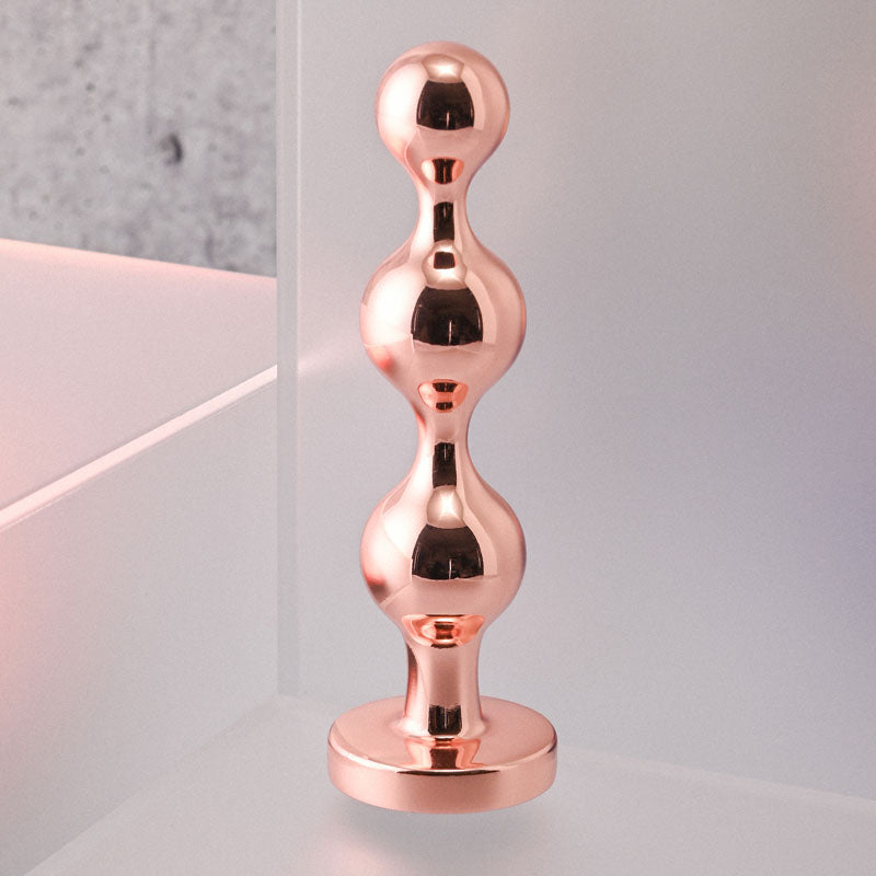 Gender X Gold Digger Small Rose Gold Small Butt Plug With Black Gem Base