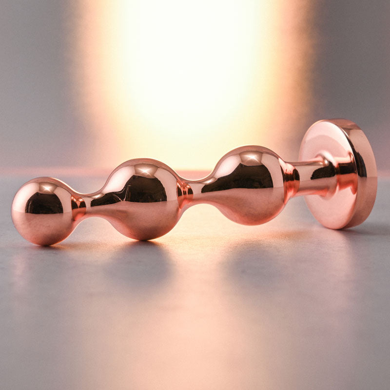 Gender X Gold Digger Small Rose Gold Small Butt Plug With Black Gem Base