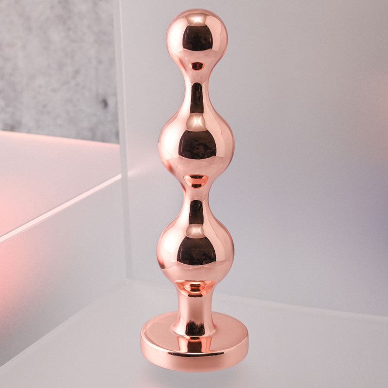 Gender X Gold Digger Large Rose Gold Large Butt Plug With Black Gem Base